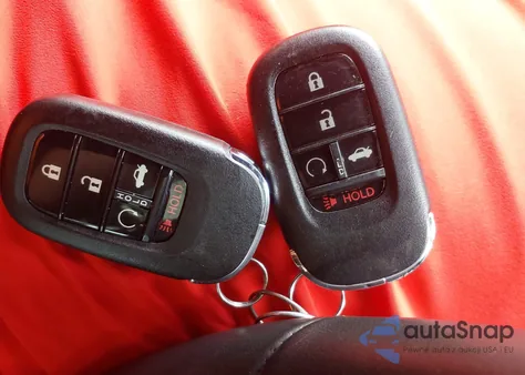 2022 Honda Civic Touring z USA, uszkodzony, nr VIN 2HGFE1F9XNH321703